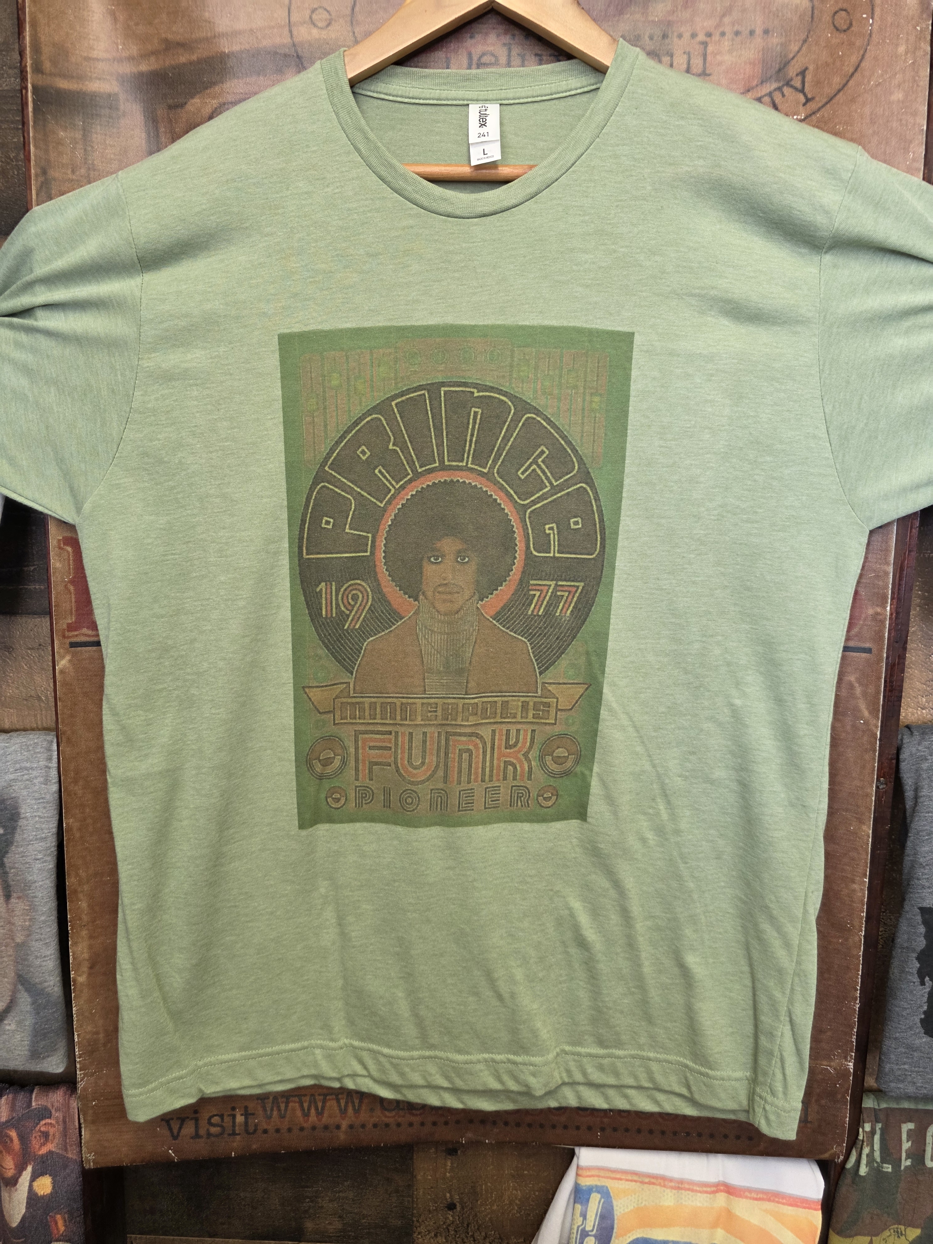 Tultex Light Green Prince 1977 Funk Pioneer Graphic Tee